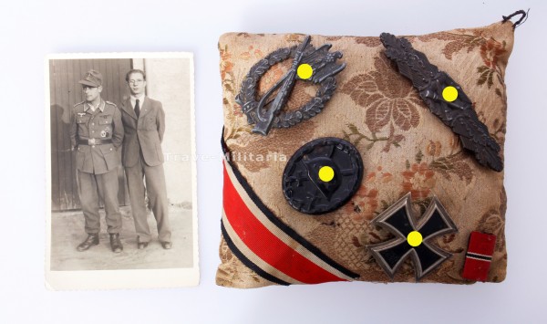 Ordenskissen eines Kämpfers mit Fotos