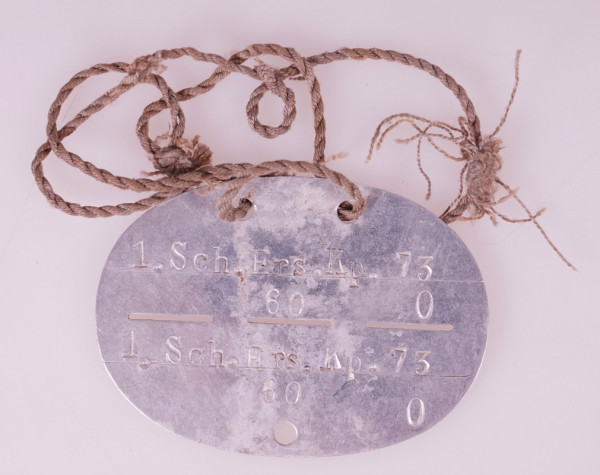 Erkennungsmarke 1. Sch. Ers. Kp. 73 60 0